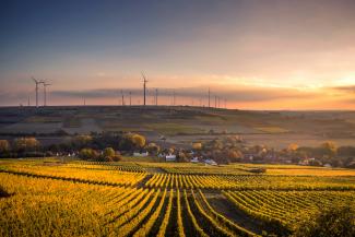 structural shot of wind mills during daytime by Karsten Würth courtesy of Unsplash.